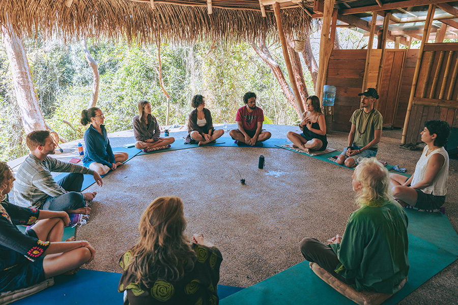 Participants sitting in a circle at Soul Medicine in Nayarit, Mexico.